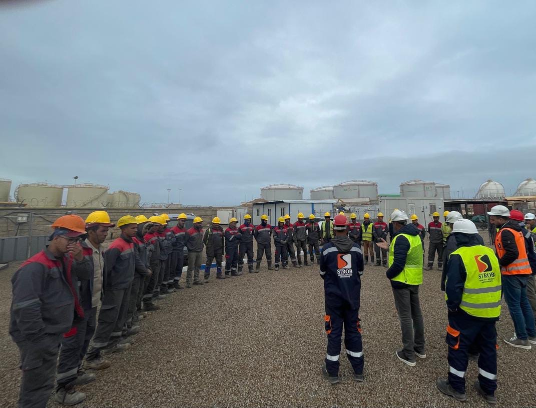 Réglage de bourreuse sur chantier de nuit